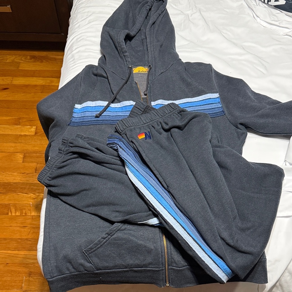 Aviator Nation charcoal with blue stripes hoodie and joggers sweatsuit.